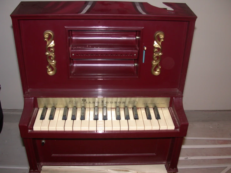 an ornate organ on display in a room