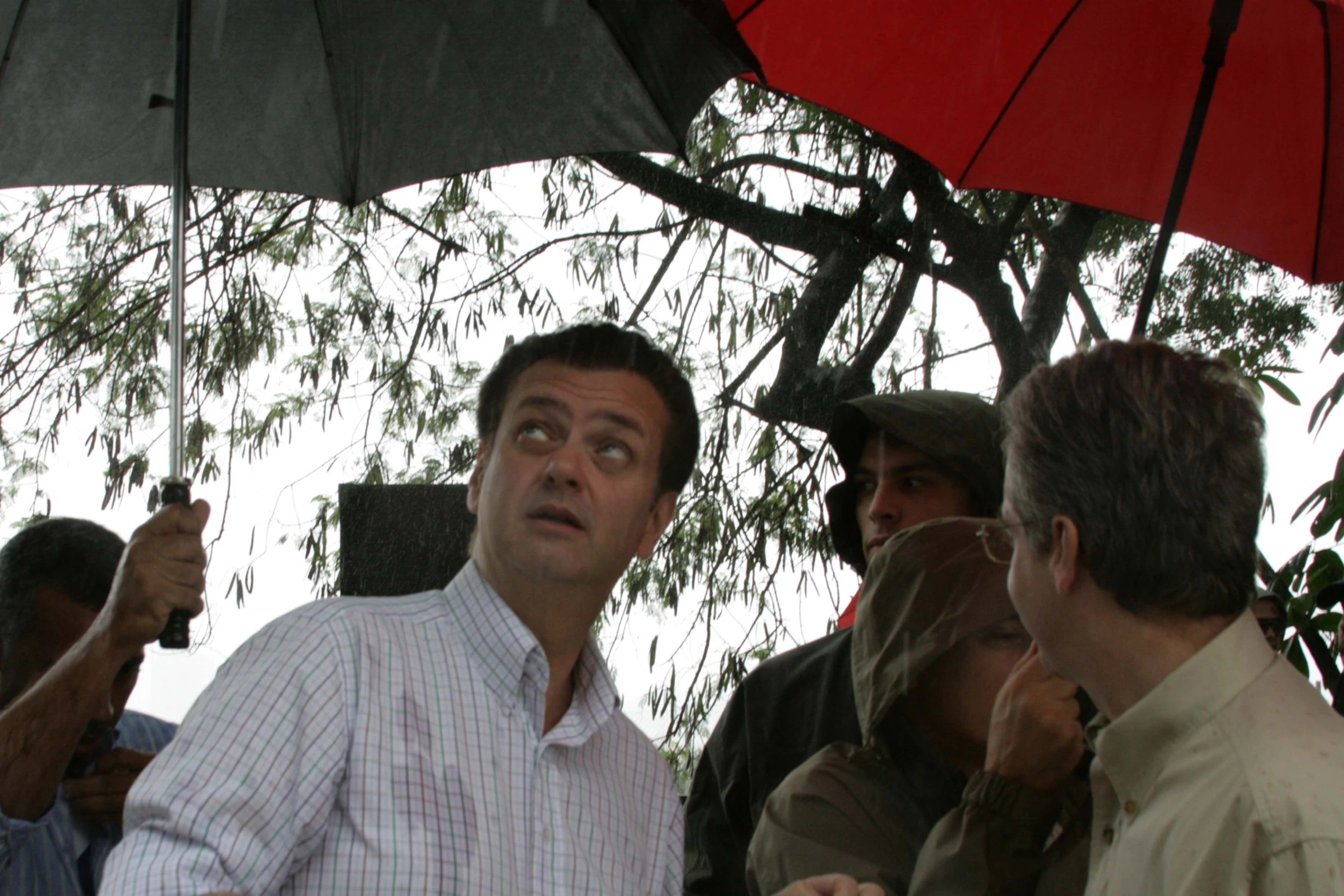 an image of man speaking at outdoor event