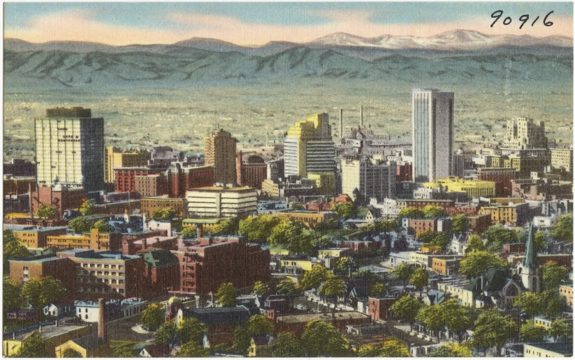 the city of boise, california with mountains in the background