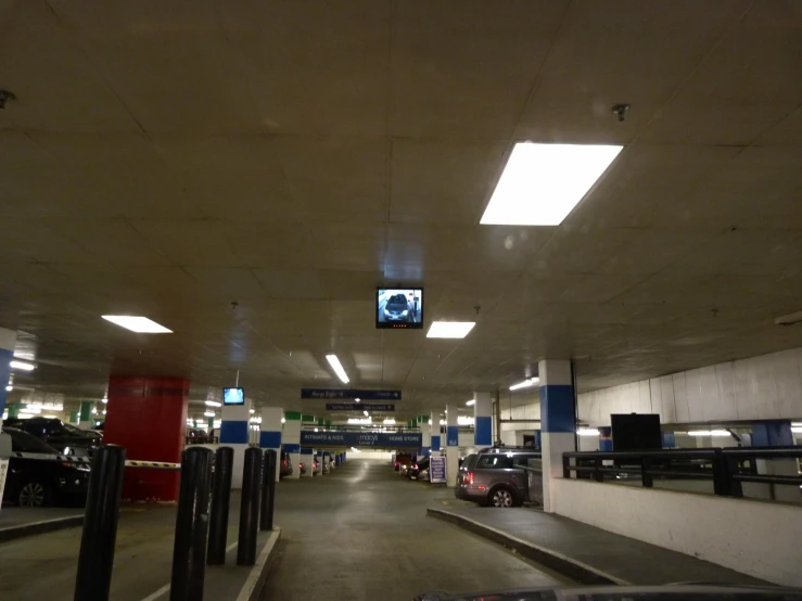 a parking garage filled with lots of traffic