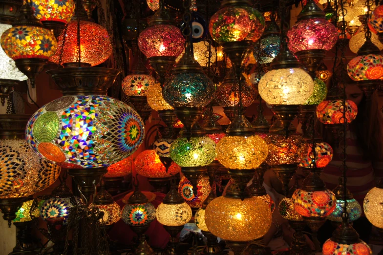 many lights and lamps at a stall for sale