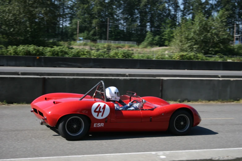 an older sports car with a number forty on the side