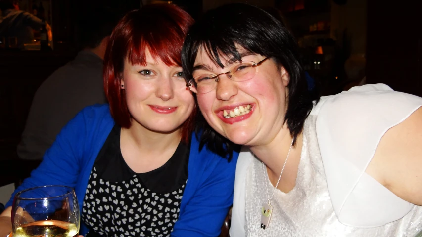 two women are posing for a picture together