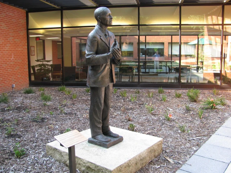 the statue is on display at the outside of the building