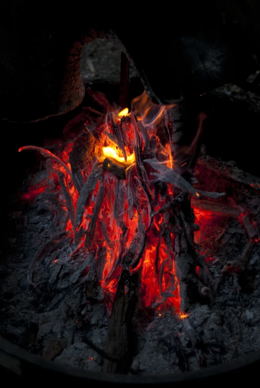 a  charcoal fire with bright yellow flames