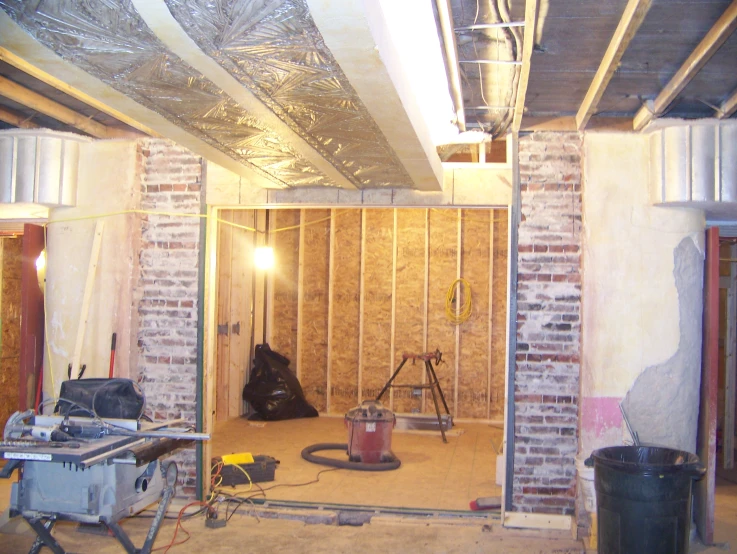 a garage area with a hard wood floor