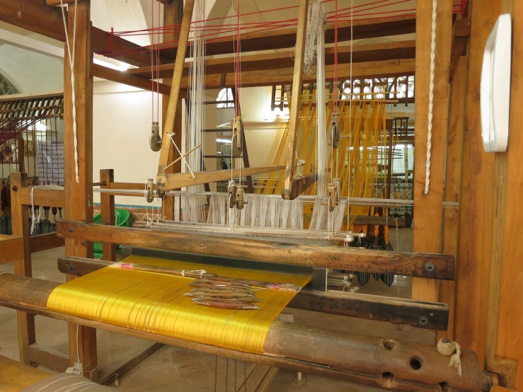 a sewing machine inside of a wooden building