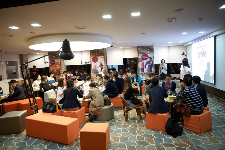 an image of people sitting in the meeting room