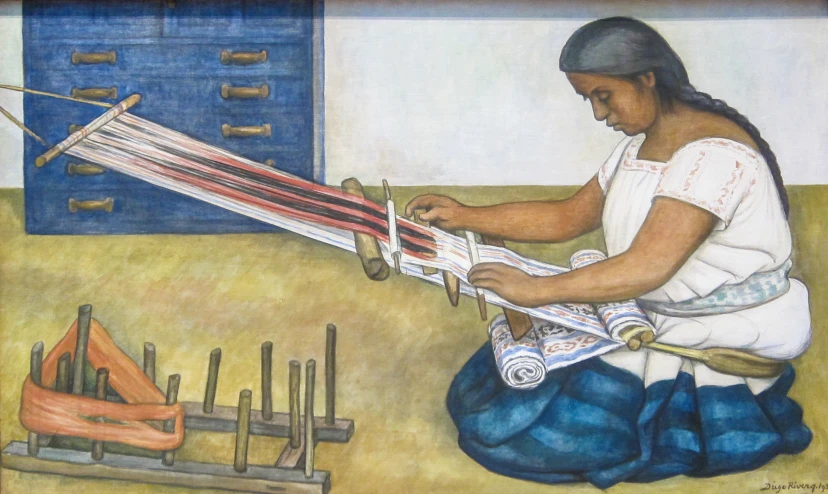 woman weaving fabric in her home made room