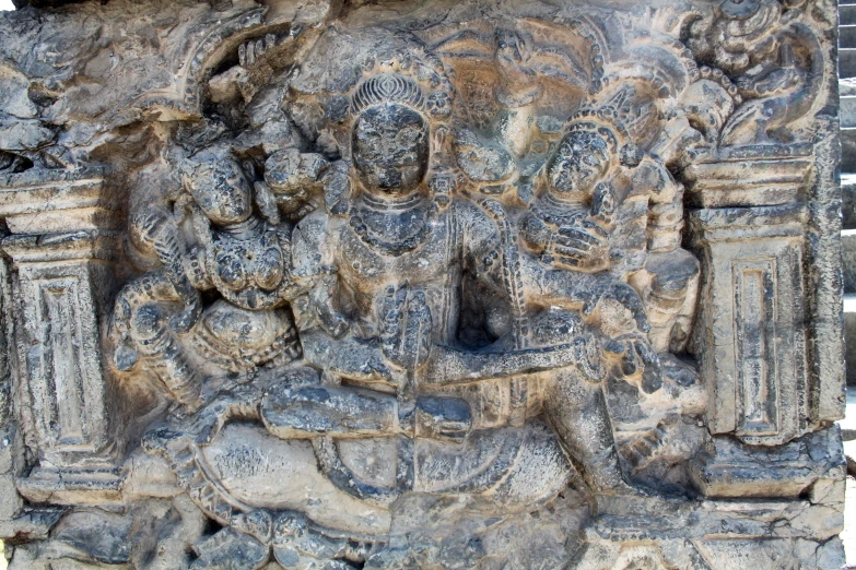 sculpture depicting a scene in indian architecture