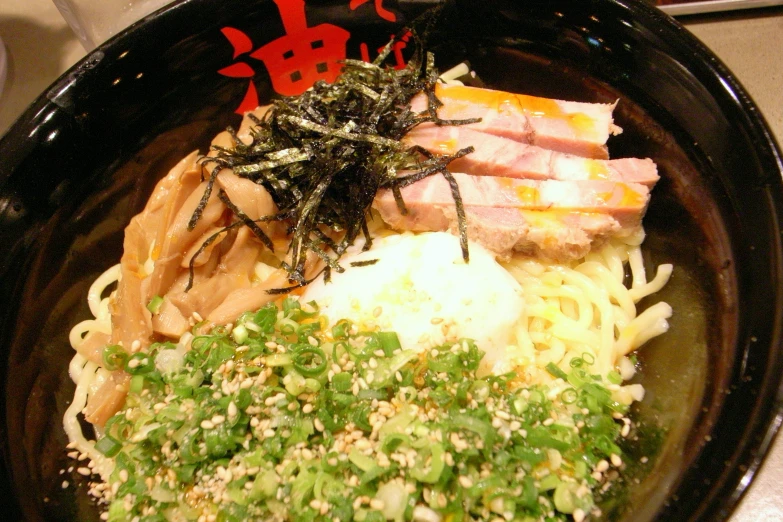 an oriental dish is on display on a plate