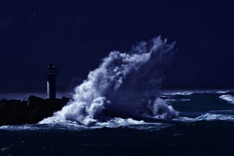 a lighthouse that is on top of a large wave