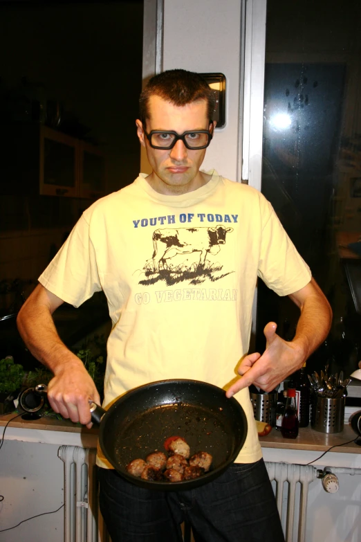 a man standing with a set in his hands