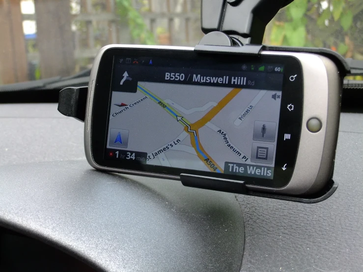 a car is shown with a gps device in it
