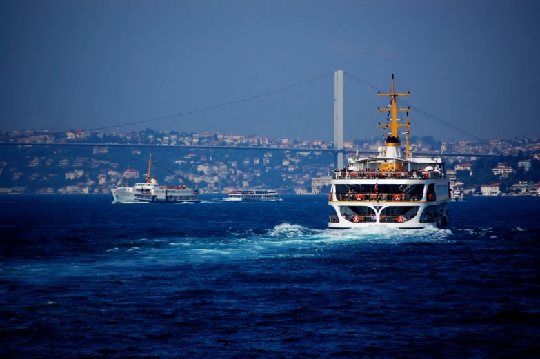 ships sailing near each other in the water