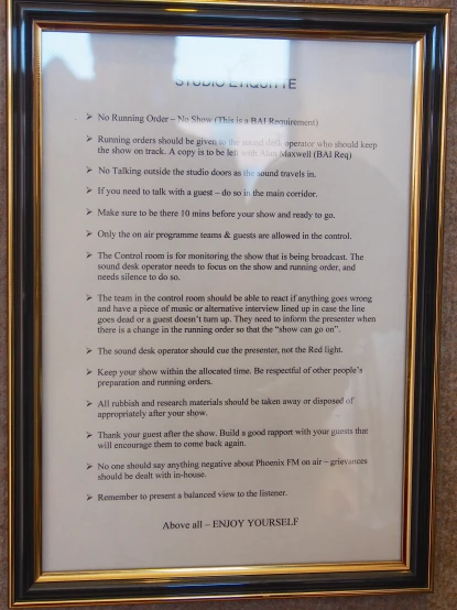 a framed poem is on display in the museum