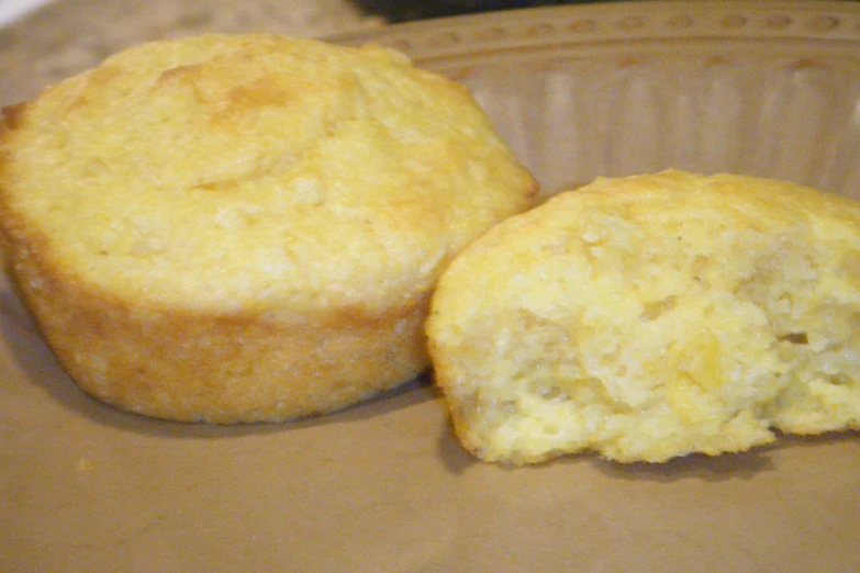 two muffins are shown in a container