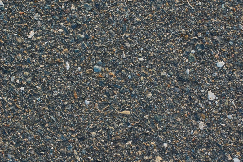 a street with rocks and stones on it