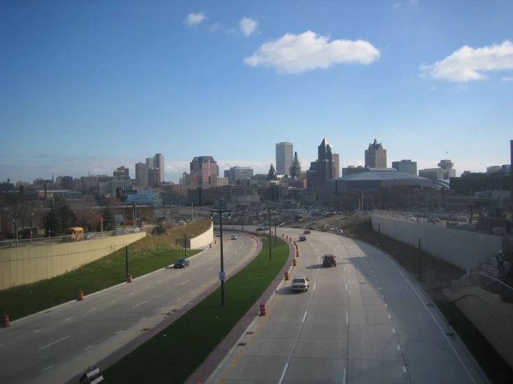 this is an aerial view of the city with a large highway