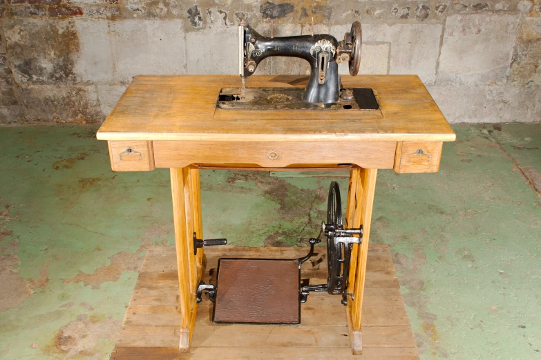an antique sewing machine sits on a table