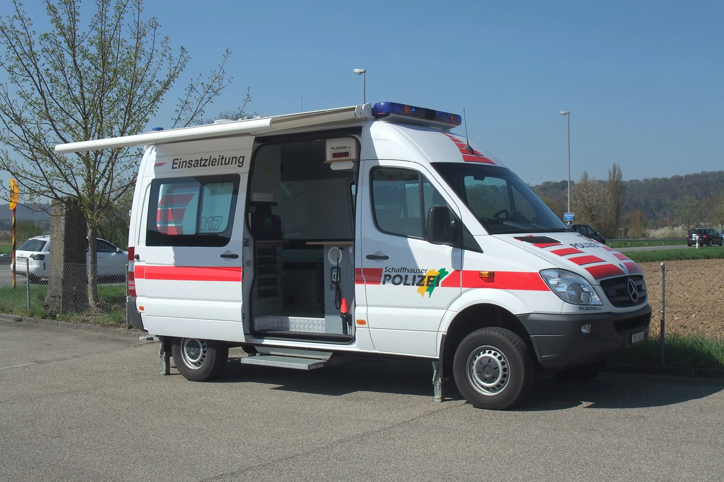 an ambulance van is parked on a lot