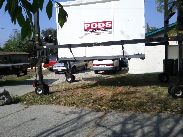 a pole with a sign on it in the yard