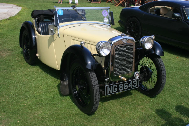 an old fashioned model t car on display