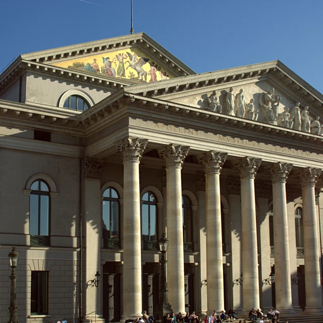 large building with columns and arches in front