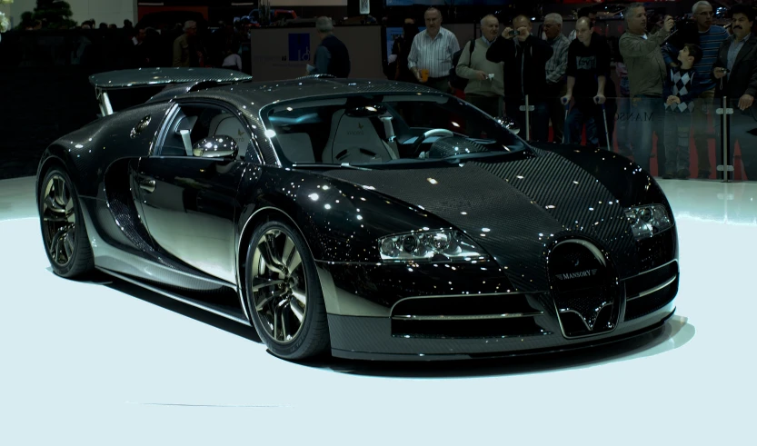 a bugatti on display at an automobile show