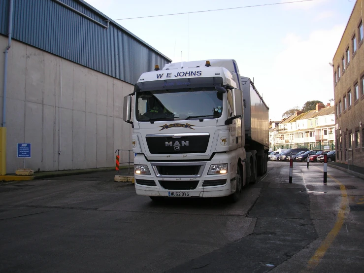 a very large truck that is driving down the road