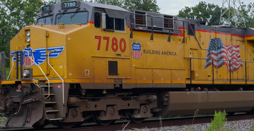 an old train sits on the train tracks