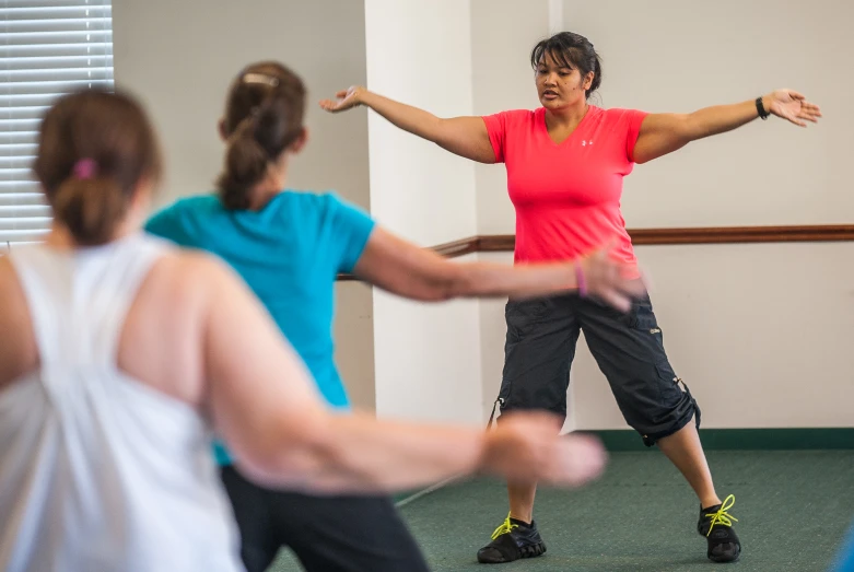 woman doing different exercises in a gym setting