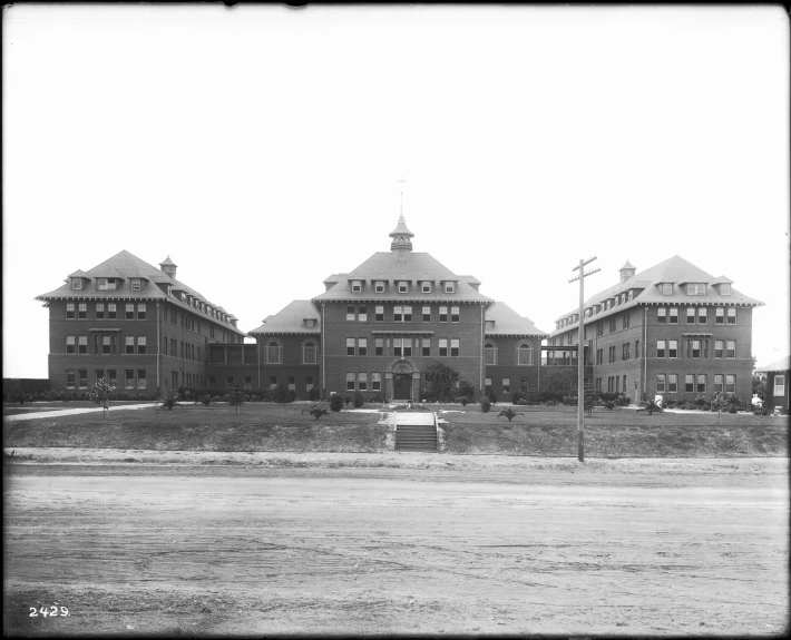 black and white pograph of a building with spires on top