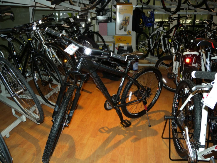 a shop filled with bikes and bicycles for sale