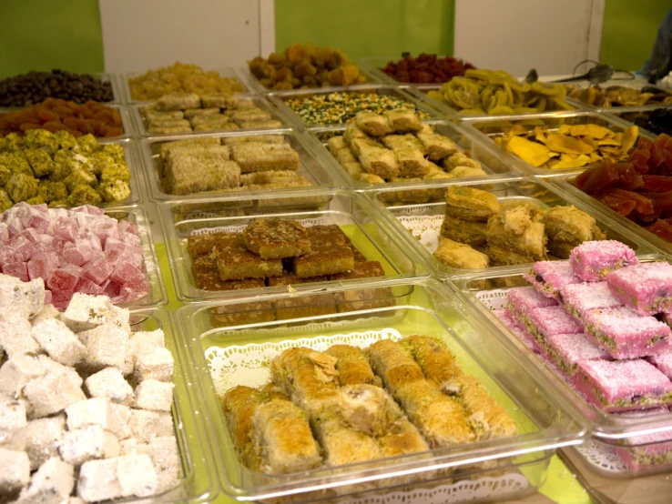 a group of small trays of food on top of a table