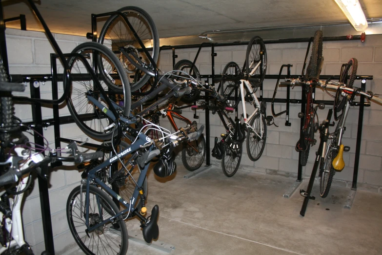 there are many bikes parked against the wall