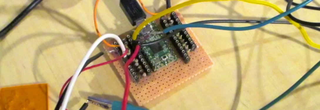 an electronic board that is connected to various wires and other parts