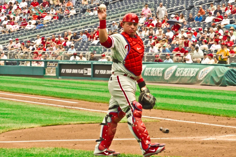 the baseball player is throwing the ball toward his opponent