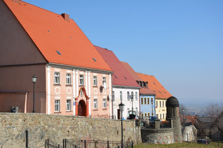 many different buildings, with orange roof tops