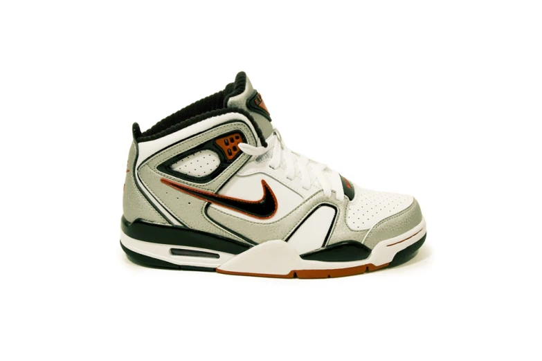 a pair of sneakers that are gray, black and orange