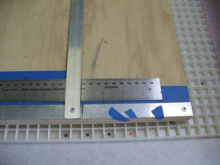 there is a ruler that has been placed on the table