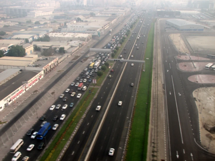 traffic sits on the empty highway near the city