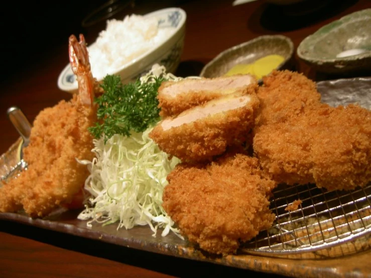 some fried food is sitting on the cooling rack