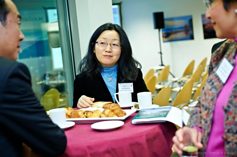 two women having lunch in a break room