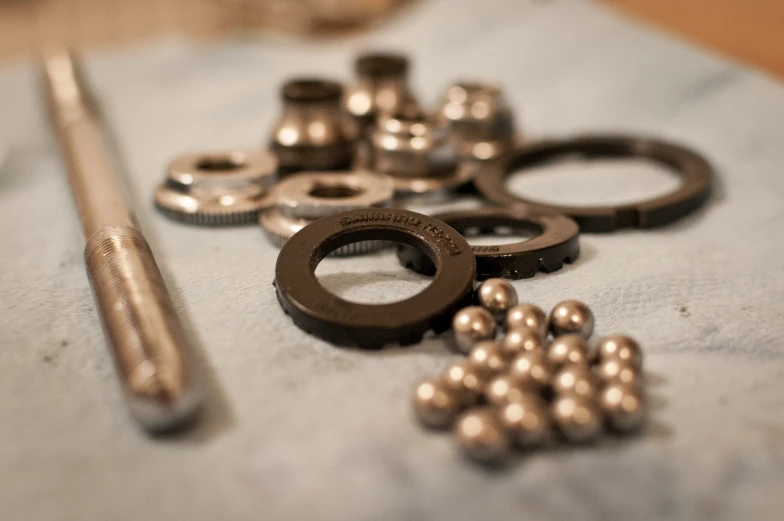 there are several pieces of jewelry that are laying on the table