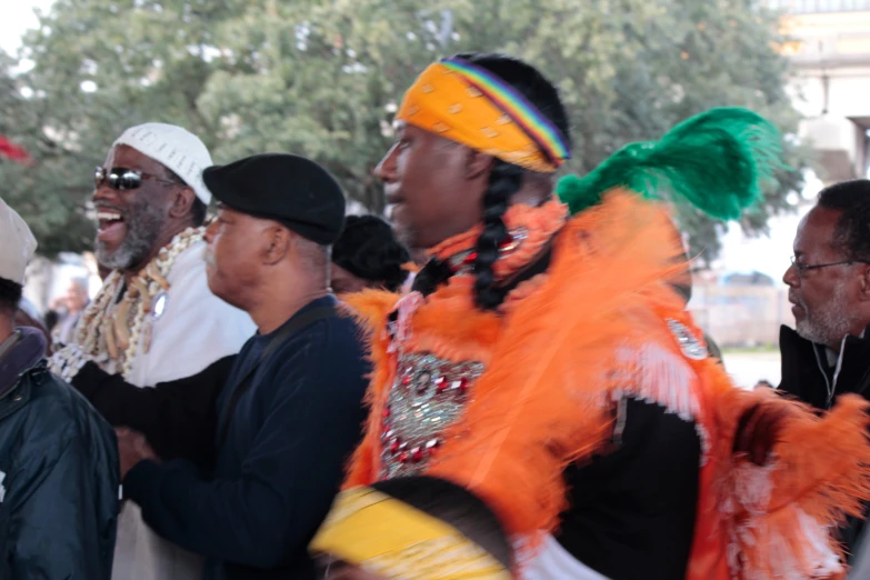 a group of people standing next to each other