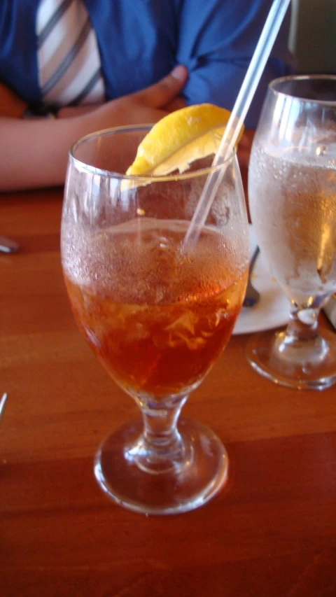 two beverages are sitting on a table ready to be eaten