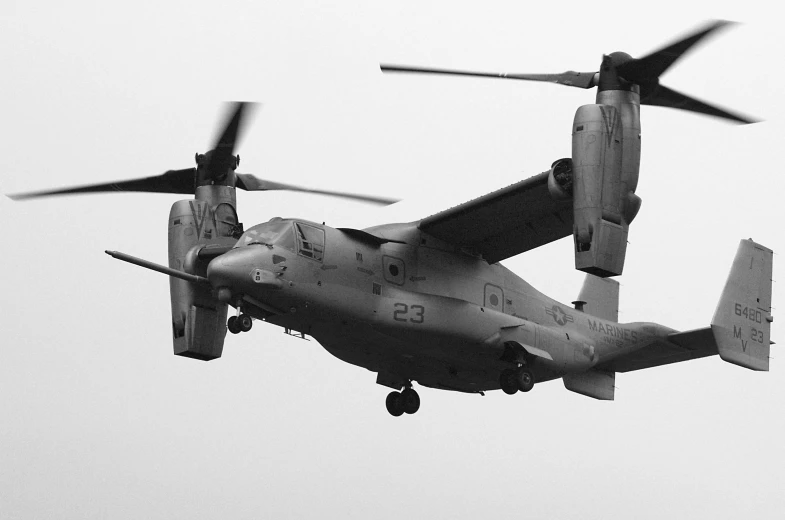 a large army plane flying in the air