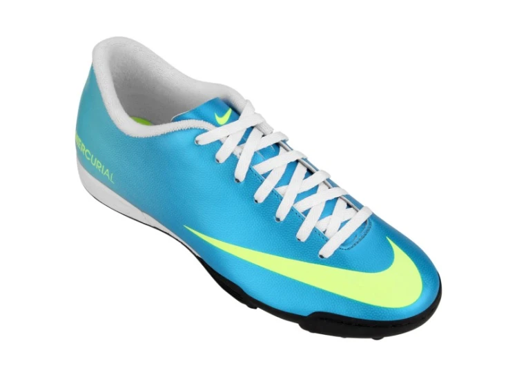 blue and green nike soccer shoe