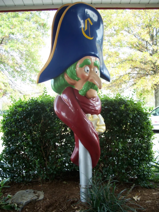 a statue of a woman dressed like a pirate